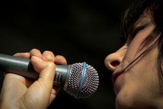 Very close up of Daphné singing